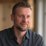 Jon, founder of Earls Golf, photographed in studio portrait